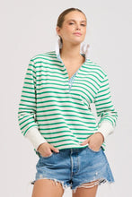 Load image into Gallery viewer, Est1971 green & white stripe rugby jumper with a frill collar and contrast trim on the front placket and collar stand. Flattering hi-low hem.