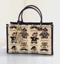 Load and play video in Gallery viewer, Henney Bear Top Handle Bag with Charms - Henney Password