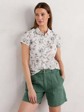 Load image into Gallery viewer, Cotton full button shirt with collar and capped sleeves. White with sketches of flowers in subtle greys,tans, greens.