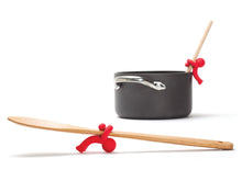 Load image into Gallery viewer, Meet Doug, the little red silicone fellow who will hold your spoon so it doesn't disappear into the soup.