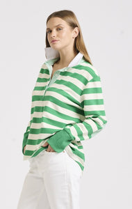 Sporty year-round style. This model looks great in our green and white striped rugby jumper, proving it's a versatile piece for any season. The breathable cotton and relaxed fit make it perfect for layering, while the contrasting elbow patches, collar stand and front placket add a point of difference.