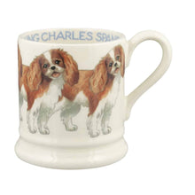 Load image into Gallery viewer, Emma Bridgewater Pottery 1/2 Pint mug hand decorated with adorable King Charles Spaniels. 
