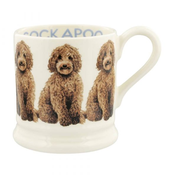 Emma Bridgewater Pottery 1/2 Pint Mug with hand painted Cockapoos around the outside and the word Cockapoo on the inside rim.