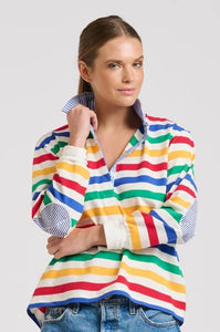 Lightweight Cotton rugby top in a gorgeous multi coloured stripe - blue, green, red, white & yellow. Tonal elbow patches & collar in blue/white fine stripe. Long sleeve and slight high low front to back.