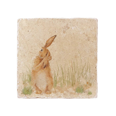 A marble platter from the UK decorated with an adorable little hare cleaning his ear.