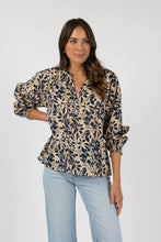 Load image into Gallery viewer, V neck blouse with soft balloon sleeves &amp; elastic cuff in 3/4 length. Relaxed loose fit in navy floral print on off white.
