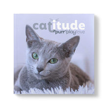 Load image into Gallery viewer, Hardcover book featuring inspiring cat-themed messages and stunning cat photography. 108 pages of self-care and encouragement.
