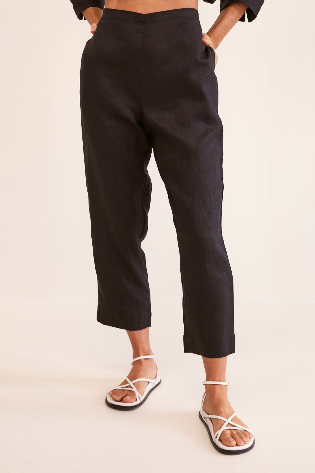 See Saw linen flat front pant with elastic back, 7/8 length in black.