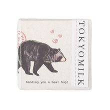 Load image into Gallery viewer, Small cake of soap wrapped in linen paper with a brown bear and the text &#39;sending you a bear hug&#39;.
