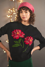 Load image into Gallery viewer, Relax fit round neck wool blend jumper in black with two large pink/red flowers on the front.
