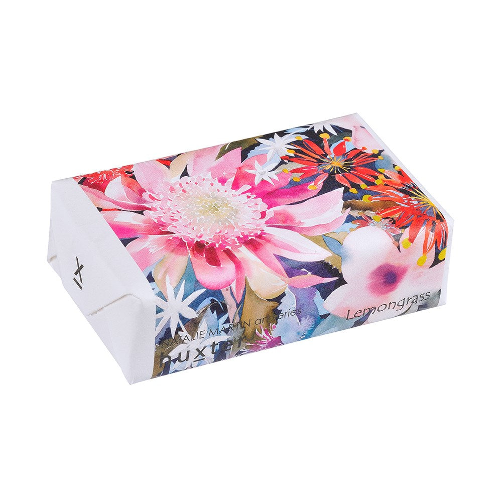 Hand wrapped soap in artwork by Natalie Martin, in a floral design.