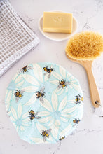 Load image into Gallery viewer, A shower cap with a touch of luxury, soft linen on the outer and water resistant lining. The stunning pattern of flowers and bees will remind you of a spring garden.
