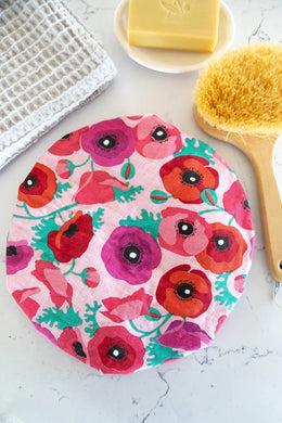 A stunning shower cap with beautiful red and pink poppies on the linen fabric outer and a water resistant lining. Bring the garden to the shower.