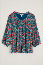 Load image into Gallery viewer, Cotton &amp; bamboo blend 3/4 sleeve A line tee style top. Navy base with red flowers and white splashes.
